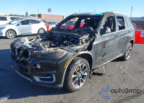 2014 BMW X5 Sdrive35I z USA, uszkodzony, nr VIN 5UXKR2C53E0C01370